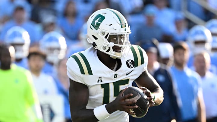 Sep 7, 2024; Chapel Hill, North Carolina, USA; Charlotte 49ers quarterback Deshawn Purdie (15) looks to pass in the third quarter at Kenan Memorial Stadium. Mandatory Credit: Bob Donnan-Imagn Images