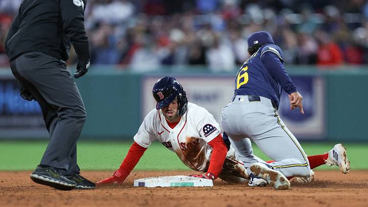 Apr 6, 2026; Boston, Massachusetts, USA; Milwaukee Brewers shortstop David Hamilton (6) tags out Boston Red Sox third baseman Caleb Durbin (5) during the second inning at Fenway Park. Mandatory Credit: Paul Rutherford-Imagn Images Apr 6, 2026; Boston, Massachusetts, USA; Milwaukee Brewers shortstop David Hamilton (6) tags out Boston Red Sox third baseman Caleb Durbin (5) during the second inning at Fenway Park. Mandatory Credit: Paul Rutherford-Imagn Images