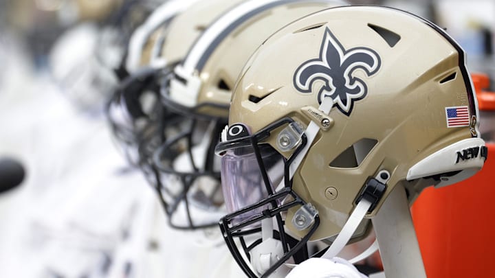 Oct 10, 2021; Landover, Maryland, USA; New Orleans Saints players' helmets on the bench against the Washington Football Team at FedExField. Mandatory Credit: Geoff Burke-Imagn Images