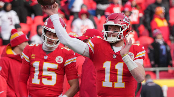 Jan 18, 2025; Kansas City, Missouri, USA; Kansas City Chiefs quarterback Carson Wentz (11) warms up against the Houston Texans prior to a 2025 AFC divisional round game at GEHA Field at Arrowhead Stadium. Mandatory Credit: Denny Medley-Imagn Images