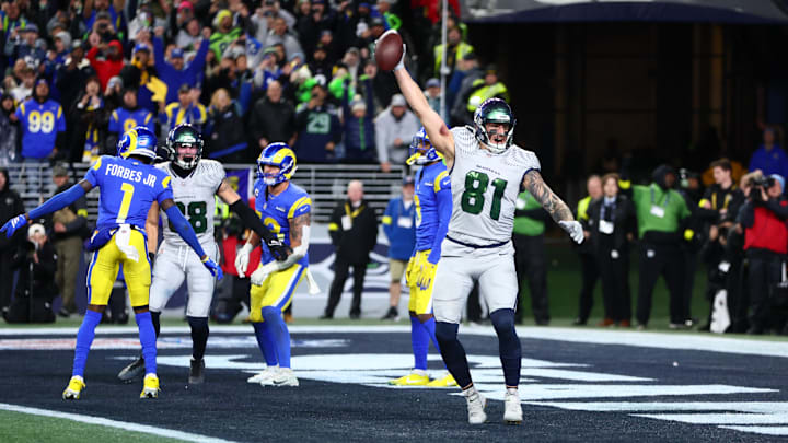 Seattle Seahawks tight end Eric Saubert (81) celebrates after making a catch for a game-winning two-point conversion.