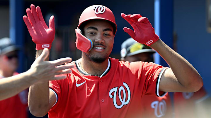 Mar 13, 2025; Port Charlotte, Florida, USA; Washington Nationals designated hitter James Woods (29) celebrates with his teammates after hitting a three run home run in the first inning against the Tampa Bays Rays during spring training at Charlotte Sports Park Mar 13, 2025; Port Charlotte, Florida, USA; Washington Nationals designated hitter James Woods (29) celebrates with his teammates after hitting a three run home run in the first inning against the Tampa Bays Rays during spring training at Charlotte Sports Park