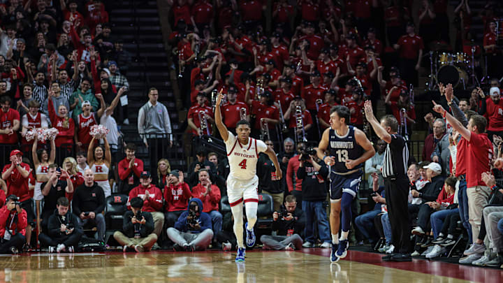Nov 15, 2024; Piscataway, New Jersey, USA; Rutgers Scarlet Knights guard Ace Bailey (4) reacts after making a three point basket during the first half against the Monmouth Hawks at Jersey Mike's Arena. Mandatory Credit: Vincent Carchietta-Imagn Images Nov 15, 2024; Piscataway, New Jersey, USA; Rutgers Scarlet Knights guard Ace Bailey (4) reacts after making a three point basket during the first half against the Monmouth Hawks at Jersey Mike's Arena. Mandatory Credit: Vincent Carchietta-Imagn Images