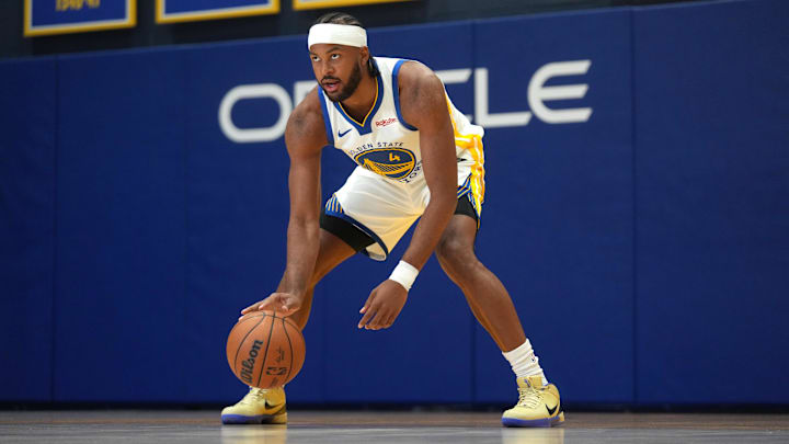 Sep 29, 2025; San Francisco, CA, USA; Golden State Warriors guard Moses Moody (4) dribbles the ball during Media Day at the Chase Center.