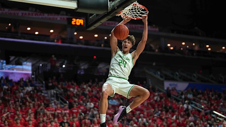 Storm Lake junior Jaidyn Coon dunks the basketball against ADM during the Iowa high school boys state basketball tournament on Monday, March 10, 2025, at Wells Fargo Arena in Des Moines. Mandatory Credit: Bryon Houlgrave-The Des Moines Register` Storm Lake junior Jaidyn Coon dunks the basketball against ADM during the Iowa high school boys state basketball tournament on Monday, March 10, 2025, at Wells Fargo Arena in Des Moines. Mandatory Credit: Bryon Houlgrave-The Des Moines Register`