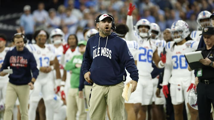 Jan 1, 2026; New Orleans, LA, USA; Mississippi Rebels head coach Pete Golding (center) reacts on the sidelines during the second half of the 2026 Sugar Bowl and quarterfinal game of the College Football Playoff against the Georgia Bulldogs at Caesars Superdome. Mandatory Credit: Amber Searls-Imagn Images