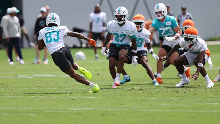 Miami Dolphins wide receiver Kevin Coleman Jr. (83) runs past players during mini camp at Baptist Health Training Complex during minicamp.