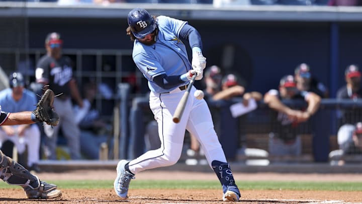Mar 10, 2026; Port Charlotte, Florida, USA; Tampa Bay Rays right fielder Ryan Vilade (26) hits an rbi single against the Minnesota Twins in the seventh inning during spring training at Charlotte Sports Park. Mandatory Credit: Nathan Ray Seebeck-Imagn Images