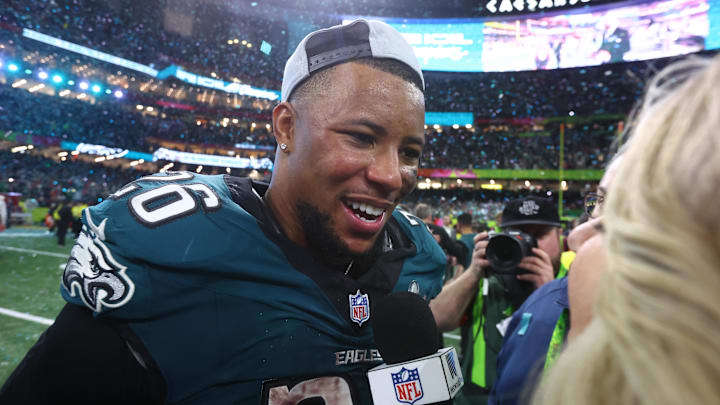 Philadelphia Eagles running back Saquon Barkley is interviewed on field after defeating the Kansas City Chiefs in Super Bowl LIX at Ceasars Superdome. Philadelphia Eagles running back Saquon Barkley is interviewed on field after defeating the Kansas City Chiefs in Super Bowl LIX at Ceasars Superdome.