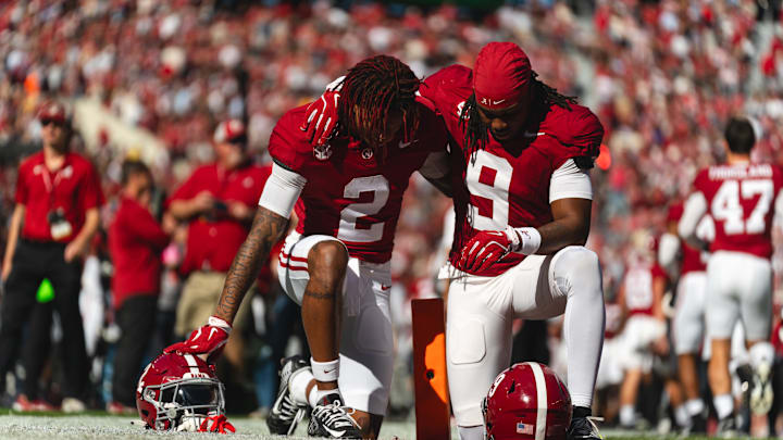 Nov 16, 2024; Tuscaloosa, Alabama, USA; Alabama Crimson Tide wide receiver Ryan Williams (2) and defensive back Jaylen Mbakwe (9) pray together in the end zone before the start of the first quarter at Bryant-Denny Stadium. Mandatory Credit: Will McLelland-Imagn Images