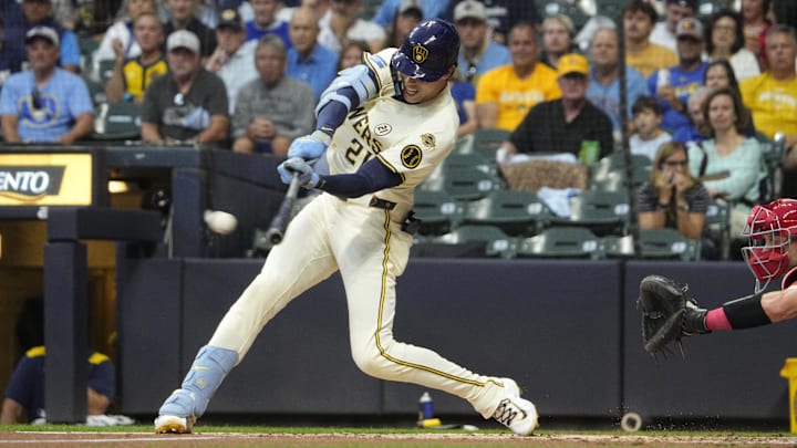 Sep 16, 2025; Milwaukee, Wisconsin, USA; Milwaukee Brewers outfielder Christian Yelich (22) hits a double agains the Los Angeles Angels in the first inning at American Family Field. Mandatory Credit: Michael McLoone-Imagn Images