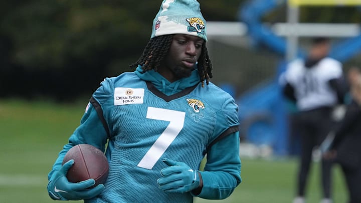 Oct 12, 2024; Watford, United Kingdom; Jacksonville Jaguars wide receiver Brian Thomas Jr. (7) carries the ball during practice at The Grove. Mandatory Credit: Kirby Lee-Imagn Images