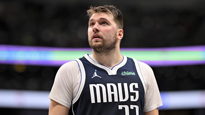 Dec 23, 2024; Dallas, Texas, USA; Dallas Mavericks guard Luka Doncic (77) checks the scoreboard during the second half against the Portland Trail Blazers at the American Airlines Center. Mandatory Credit: Jerome Miron-Imagn Images