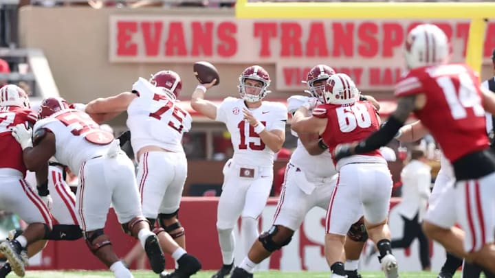 Alabama Quarterback Ty Simpson (15) looks for a receiver against Wisconsin at Camp Randall Stadium in Madison, Wisconsin on Saturday, Sep 14, 2024.