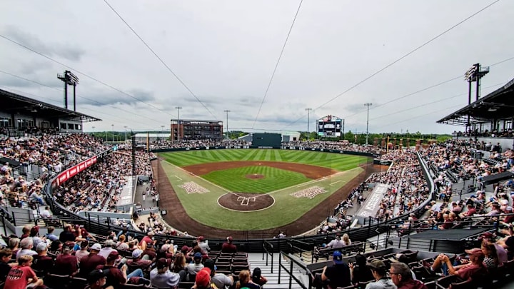 Mississippi State Fans during the game between the Ole Miss Rebels and the Mississippi State Bulldogs at Dudy Noble Field at Polk-Dement Stadium in Starkville, MS. Mississippi State Fans during the game between the Ole Miss Rebels and the Mississippi State Bulldogs at Dudy Noble Field at Polk-Dement Stadium in Starkville, MS.