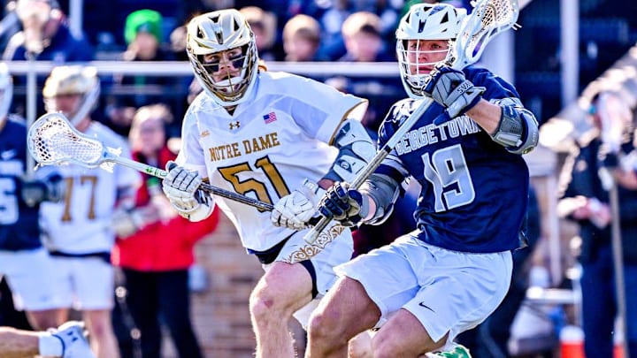 Notre Dame's Pat Kavanagh defends a a player