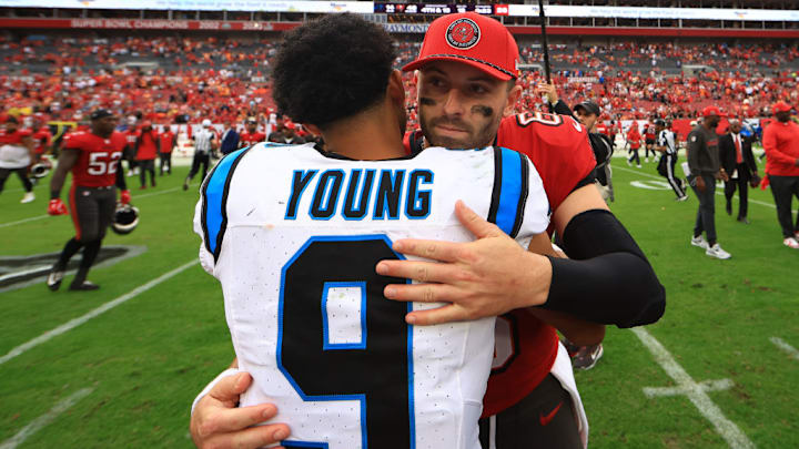 TAMPA, FLORIDA - DECEMBER 29: Baker Mayfield #6 of the Tampa Bay Buccaneers hugs Bryce Young #9 of the Carolina Panthers after the game at Raymond James Stadium on December 29, 2024 in Tampa, Florida. TAMPA, FLORIDA - DECEMBER 29: Baker Mayfield #6 of the Tampa Bay Buccaneers hugs Bryce Young #9 of the Carolina Panthers after the game at Raymond James Stadium on December 29, 2024 in Tampa, Florida.