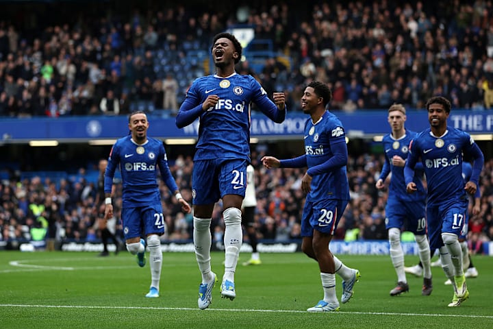 Jorrel Hato celebrates scoring for Chelsea Jorrel Hato celebrates scoring for Chelsea