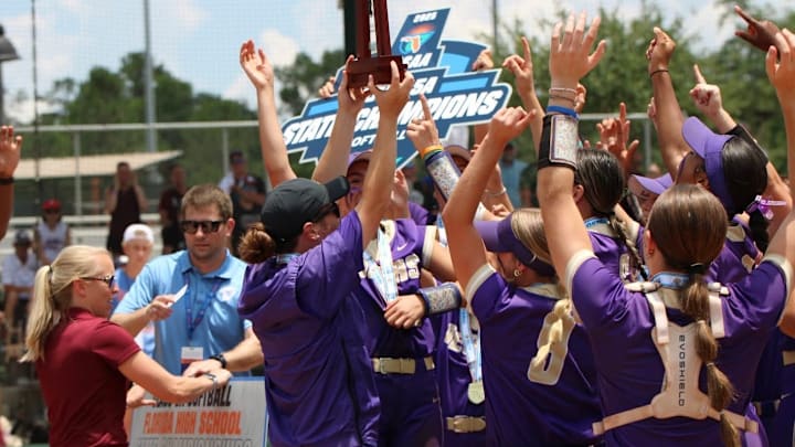 Winter Springs' softball team celebrates beating Niceville, 4-3, for the Class 5A state championship on Saturday in Longwood. It is the Bears' first title since 2019.