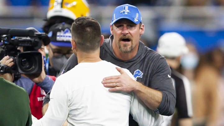Jan 9, 2022; Detroit, Michigan, USA; Detroit Lions head coach Dan Campbell hugs Green Bay Packers head coach Matt LaFleur after the game at Ford Field. Mandatory Credit: Raj Mehta-Imagn Images