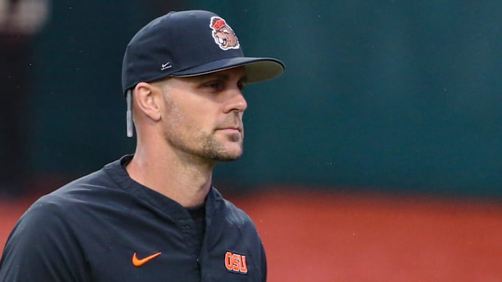 Oregon State head coach Mitch Canham heads to the dugout before an NCAA college baseball game at Goss Stadium on Friday, March 6, 2026, in Corvallis, Ore.