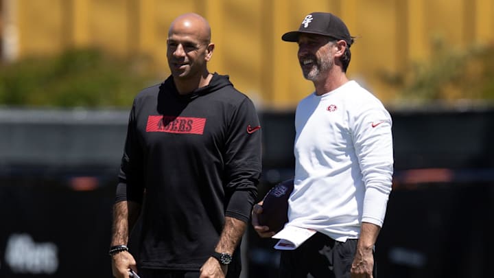 May 9, 2025; Santa Clara, CA, USA; San Francisco 49ers head coach Kyle Shanahan, right, confers with defensive coordinator Robert Saleh during the teamís rookie minicamp. Mandatory Credit: D. Ross Cameron-Imagn Images