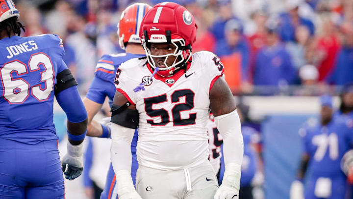 Nov 1, 2025; Jacksonville, Florida, USA; Georgia Bulldogs defensive lineman Christen Miller (52) reacts after making a tackle against the Florida Gators at EverBank Stadium. Mandatory Credit: Travis Register-Imagn Images