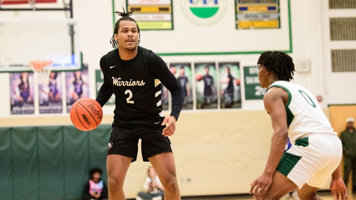 Brother Rice's Greg Grays Jr. looks to pass during the Division 1 boys basketball district final on Friday, Feb. 28, 2025.