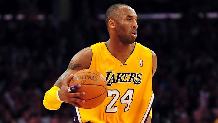 March 14, 2011; Los Angeles, CA, USA; Los Angeles Lakers shooting guard Kobe Bryant (24) moves the ball down court against the Orlando Magic during the second half at the Staples Center. Mandatory Credit: Gary A. Vasquez-Imagn Images