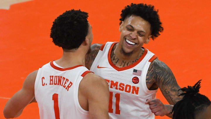 Clemson junior guard Chase Hunter (1) congratulates Clemson guard Brevin Galloway (11) after he made a shot late in the second overtime at Littlejohn Coliseum Tuesday, November 29, 2022.

Clemson Basketball Vs Penn State University Acc Big 10 Challenge