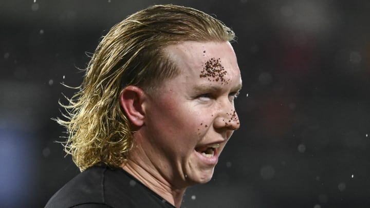 Jul 12, 2024; Baltimore, Maryland, USA;  Baltimore Orioles outfielder Heston Kjerstad (13) stands on the field after being hit by a pitch in the head during the ninth inning against the New York Yankees at Oriole Park at Camden Yards.