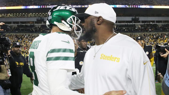 Oct 20, 2024; Pittsburgh, Pennsylvania, USA;  New York Jets quarterback Aaron Rodgers (8) and Pittsburgh Steelers head coach Mike Tomlin (right) greet each other after their game at Acrisure Stadium. Mandatory Credit: Charles LeClaire-Imagn Images