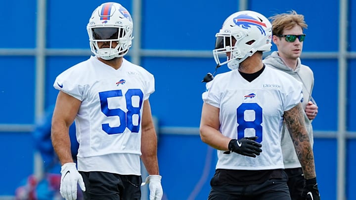 Buffalo Bills linebackers Matt Milano and Terrell Bernard head to another area of their practice field.