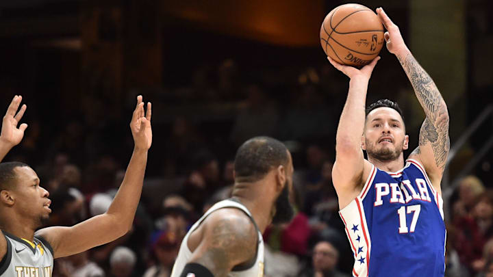 Mar 1, 2018; Cleveland, OH, USA; Philadelphia 76ers guard JJ Redick (17) shoots over the defense of Cleveland Cavaliers guard Rodney Hood (1) and forward LeBron James (23) during the first half at Quicken Loans Arena. Mandatory Credit: Ken Blaze-USA TODAY Sports