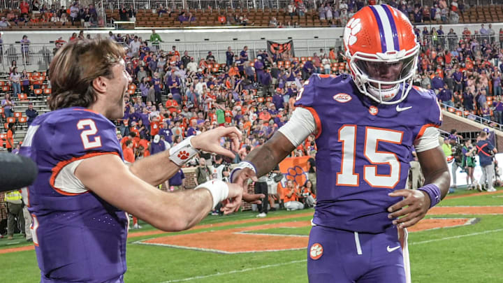 Clemson quarterback Cade Klubnik (2) reacts after quarterback Chris Denson (15) scored a touchdown late in the fourth quarter at Memorial Stadium in Clemson, S.C. Saturday, November 22, 2025.