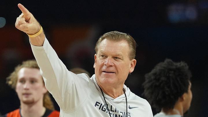Apr 3, 2026; Indianapolis, IN, USA; Illinois Fighting Illini head coach Brad Underwood directs players during a practice session ahead of the Final Four of the men's 2026 NCAA Tournament at Lucas Oil Stadium. Mandatory Credit: Robert Deutsch-Imagn Images
