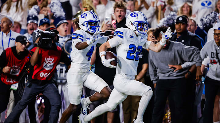 BYU safety Tommy Prassas returns a fumble for a touchdown against No. 13 Kansas State
