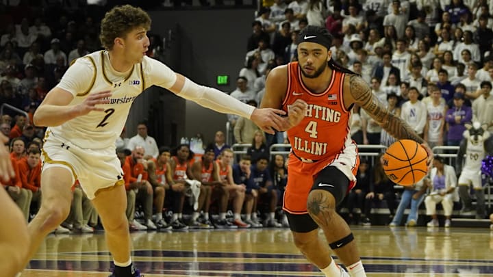 Dec 6, 2024; Evanston, Illinois, USA; Northwestern Wildcats forward Nick Martinelli (2) defends Illinois Fighting Illini guard Kylan Boswell (4) during the first half at Welsh-Ryan Arena. Mandatory Credit: David Banks-Imagn Images