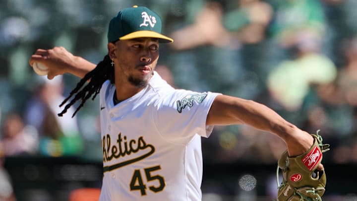 Sep 7, 2024; Oakland, California, USA; Oakland Athletics pitcher Osvaldo Bido (45) throws a pitch against the Detroit Tigers during the ninth inning at Oakland-Alameda County Coliseum. Mandatory Credit: Robert Edwards-Imagn Images