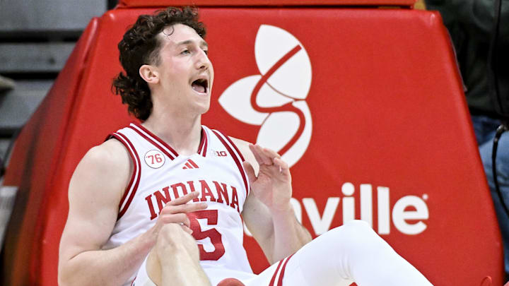 Jan 4, 2026; Bloomington, Indiana, USA; Indiana Hoosiers guard Conor Enright (5) celebrates after a play against the Washington Huskies during the first half at Simon Skjodt Assembly Hall.