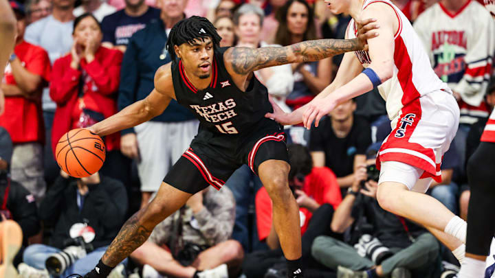 Feb 14, 2026; Tucson, Arizona, USA; Texas Tech Red Raiders forward JT Toppin (15) dribbles the ball against the Arizona Wildcats during overtime at McKale Memorial Center. Mandatory Credit: Aryanna Frank-Imagn Images Feb 14, 2026; Tucson, Arizona, USA; Texas Tech Red Raiders forward JT Toppin (15) dribbles the ball against the Arizona Wildcats during overtime at McKale Memorial Center. Mandatory Credit: Aryanna Frank-Imagn Images