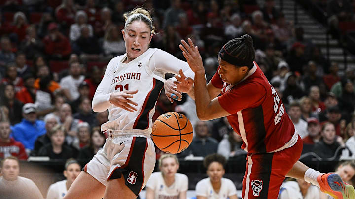 Mar 29, 2024; Portland, OR, USA; Stanford Cardinal forward Brooke Demetre (21) battle for control of the ball against NC State Wolfpack guard Zoe Brooks (35) during the second half in the semifinals of the Portland Regional of the 2024 NCAA Tournament at the Moda Center at the Moda Center. Mandatory Credit: Troy Wayrynen-Imagn Images