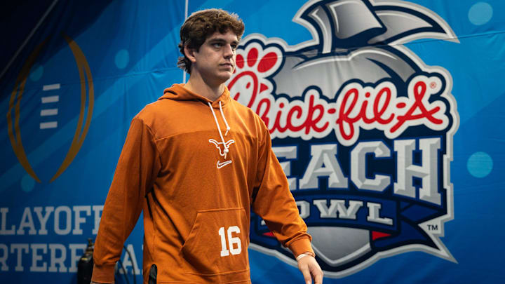Texas Longhorns quarterback Arch Manning (16) walks onto the field as the Texas Longhorns prepare to play the Arizona State Sun Devils in the Peach Bowl College Football Playoff quarterfinal at Mercedes-Benz Stadium in Atlanta, Georgia, Jan. 1, 2025. Texas Longhorns quarterback Arch Manning (16) walks onto the field as the Texas Longhorns prepare to play the Arizona State Sun Devils in the Peach Bowl College Football Playoff quarterfinal at Mercedes-Benz Stadium in Atlanta, Georgia, Jan. 1, 2025.