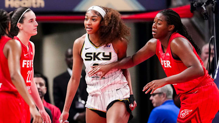 Chicago Sky forward Reese reacts to a flagrant foul from Indiana Fever guard Clark during a game at Gainbridge Fieldhouse in Indianapolis. 