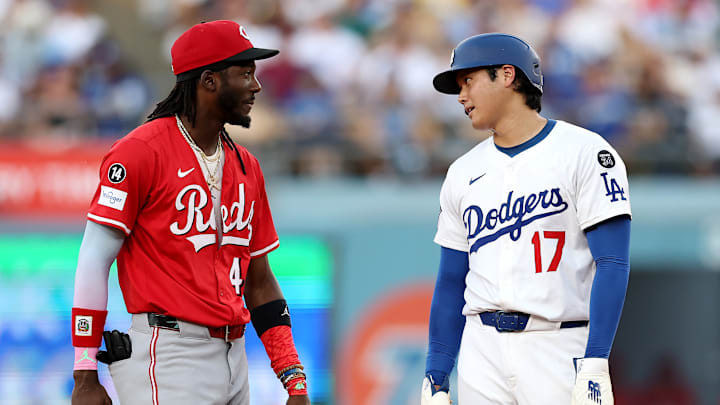 Shohei Ohtani and the defending champion Dodgers will begin their title defense against the upstart Reds on Tuesday