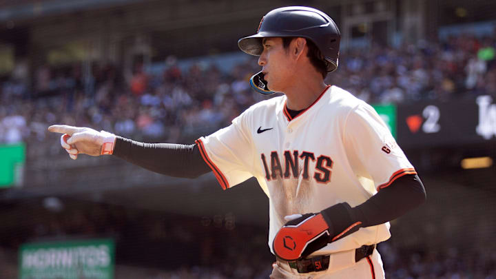 San Francisco Giants center fielder Jung Hoo Lee (51) scores from third base on a saacrifice fly against the Los Angeles Dodgers during the second inning at Oracle Park. San Francisco Giants center fielder Jung Hoo Lee (51) scores from third base on a saacrifice fly against the Los Angeles Dodgers during the second inning at Oracle Park.