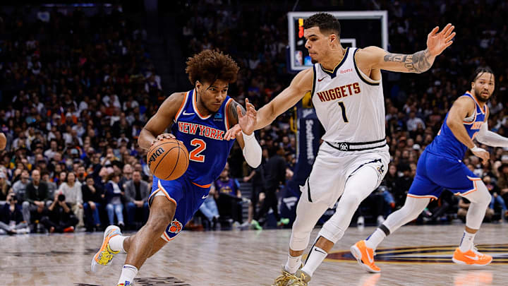 Mar 21, 2024; Denver, Colorado, USA; New York Knicks guard Miles McBride (2) drives to the basket against Denver Nuggets forward Michael Porter Jr. (1) in the fourth quarter at Ball Arena. Mandatory Credit: Isaiah J. Downing-Imagn Images Mar 21, 2024; Denver, Colorado, USA; New York Knicks guard Miles McBride (2) drives to the basket against Denver Nuggets forward Michael Porter Jr. (1) in the fourth quarter at Ball Arena. Mandatory Credit: Isaiah J. Downing-Imagn Images