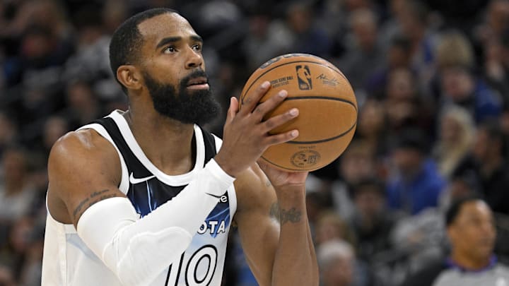 Nov 17, 2024; Minneapolis, Minnesota, USA; Minnesota Timberwolves guard Mike Conley (10) takes a free-throw against the Phoenix Suns during the fourth quarter at Target Center. Nov 17, 2024; Minneapolis, Minnesota, USA; Minnesota Timberwolves guard Mike Conley (10) takes a free-throw against the Phoenix Suns during the fourth quarter at Target Center.