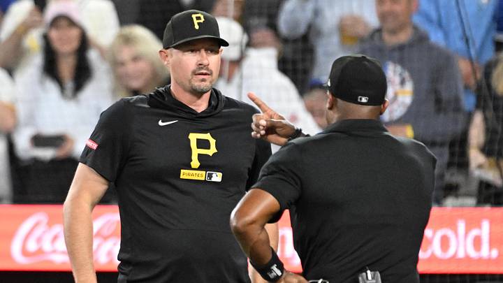 May 23, 2026; Toronto, Ontario, CAN; Pittsburgh Pirates manager Don Kelly (12) is ejected by home plate umpire Alan Porter (64) in the sixth inning against the Toronto Blue Jays at Rogers Centre. Mandatory Credit: Dan Hamilton-Imagn Images