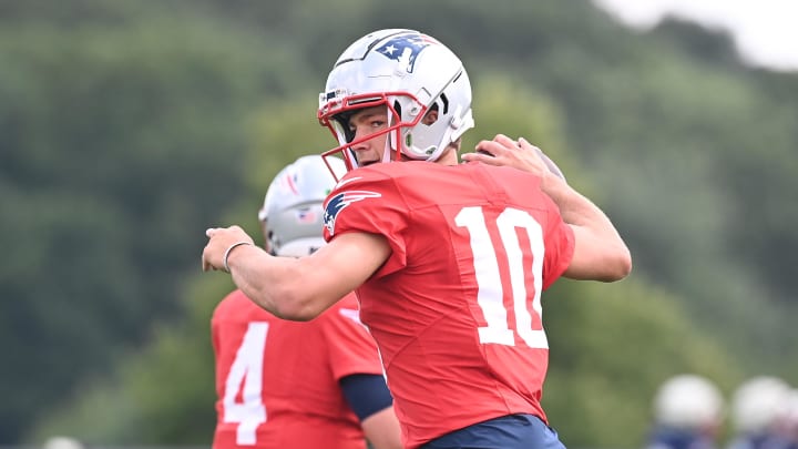 Aug 03, 2024; Foxborough, MA, USA; New England Patriots quarterback Drake Maye (10) throws a pass during training camp at Gillette Stadium. Mandatory Credit: Eric Canha-USA TODAY Sports Aug 03, 2024; Foxborough, MA, USA; New England Patriots quarterback Drake Maye (10) throws a pass during training camp at Gillette Stadium. Mandatory Credit: Eric Canha-USA TODAY Sports